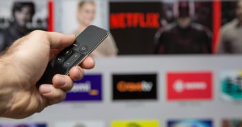 Human Hand Holding The New Apple Tv Siri Remote © Onfokus/GettyImages